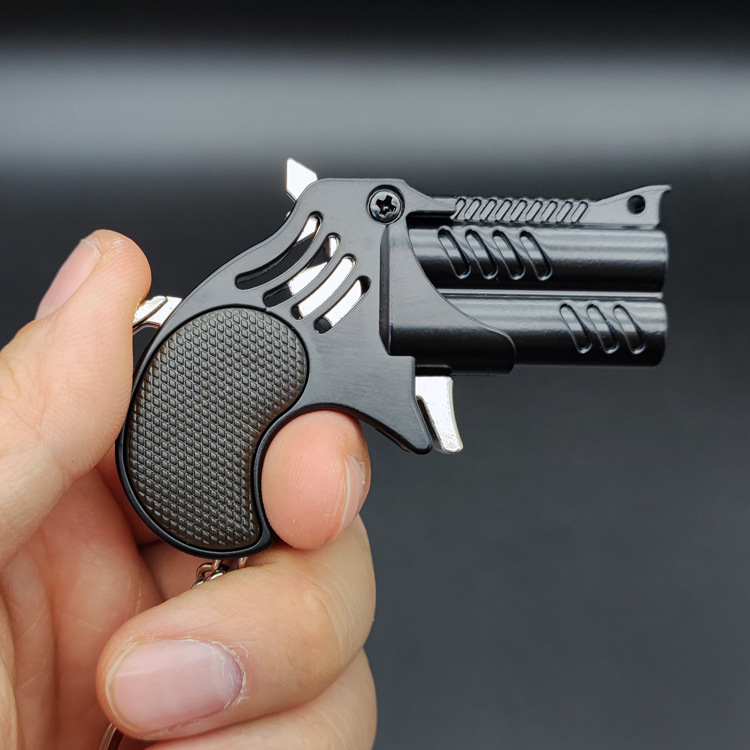 Metal mini pendant folding rubber band gun (random 50