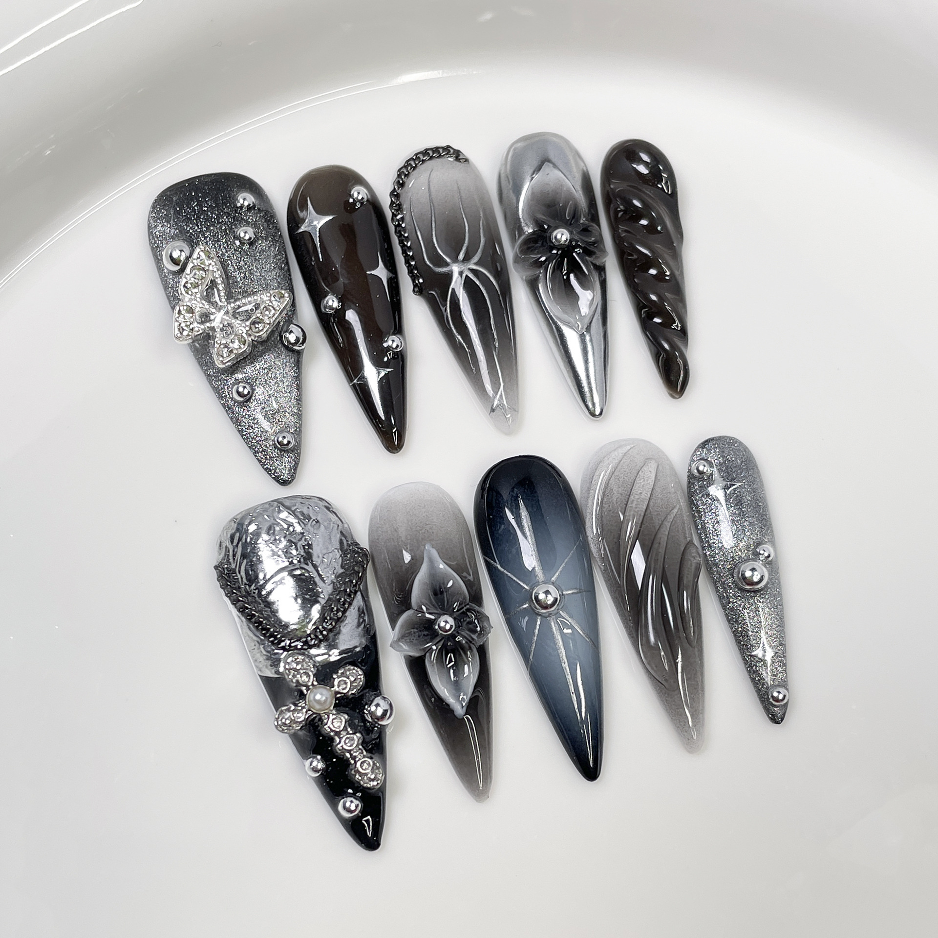 Long Pointed Dark-hued Sweet-and-cool Cat-eye Nail Art With 3D Sculpted Detailing