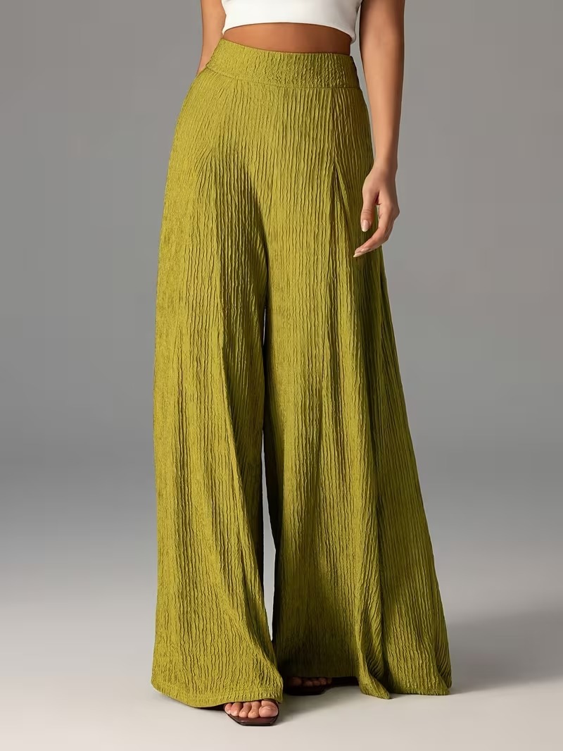 Pantalones holgados de color liso con cintura elástica y talle alto. 67409e35 9d68 401e 9d43 497c7bbb129a