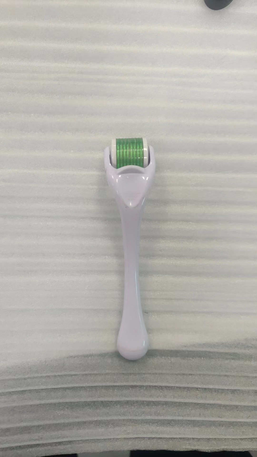 White Handle Green Wheel