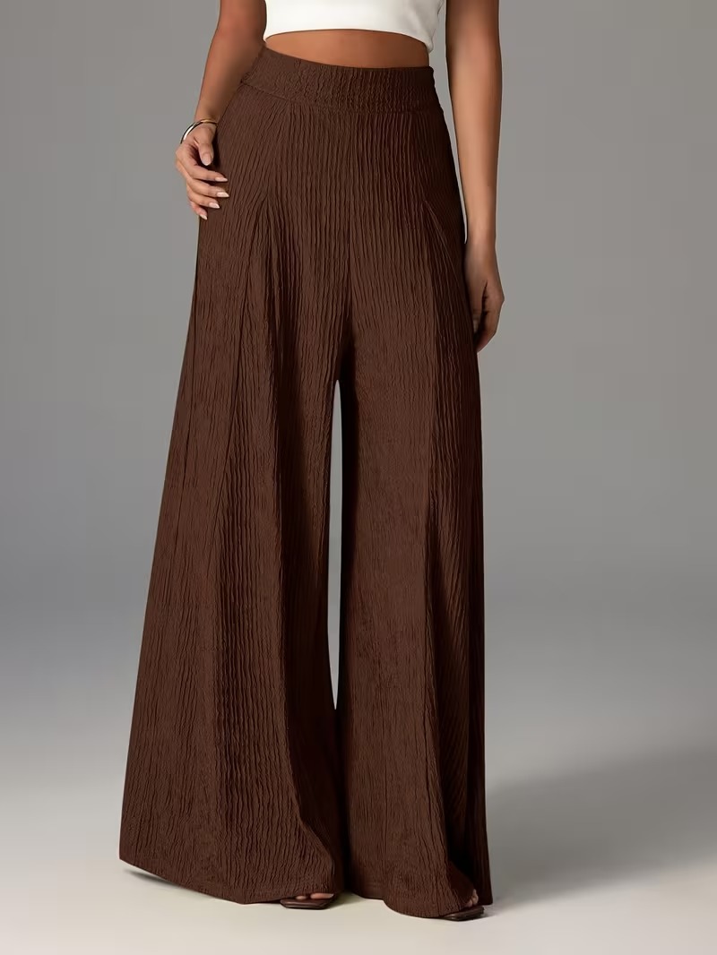 Pantalones holgados de color liso con cintura elástica y talle alto. 67e61d4a D5fc 48d5 Acdb 117251db4c0b