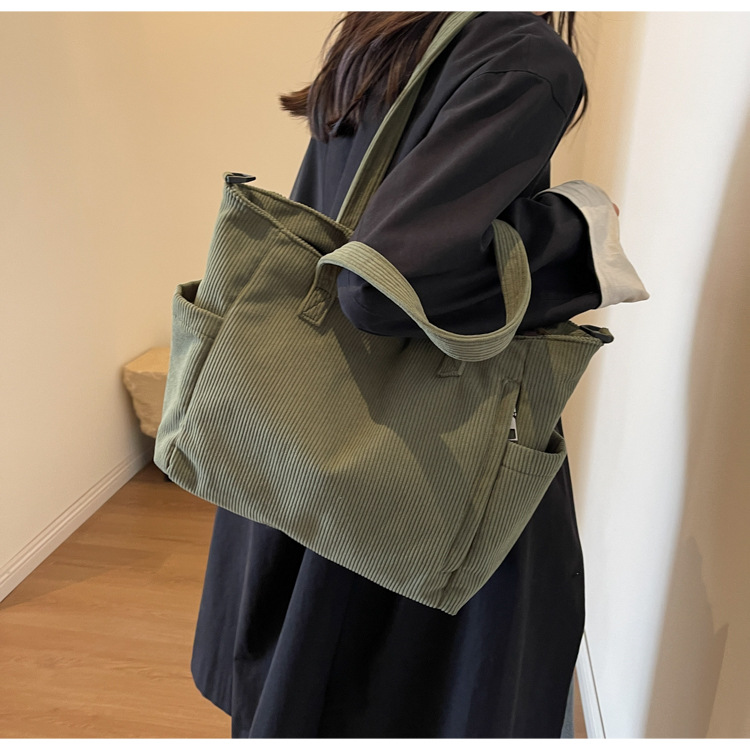 Large Capacity Art Student Shoulder Bag. Product information: Lining texture: Polyester, Applicable scenario: leisure travel, Color: creamy-white, green, black, Outer bag type: Sandwich pocket, Hardness: medium and soft, Material: corduroy, Suitcase shape