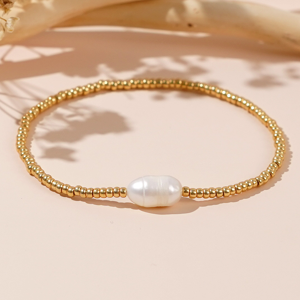 Affordable Luxury Pearl Bracelet A Chic Woven Gold-bead Accessory To Elevate Your Look