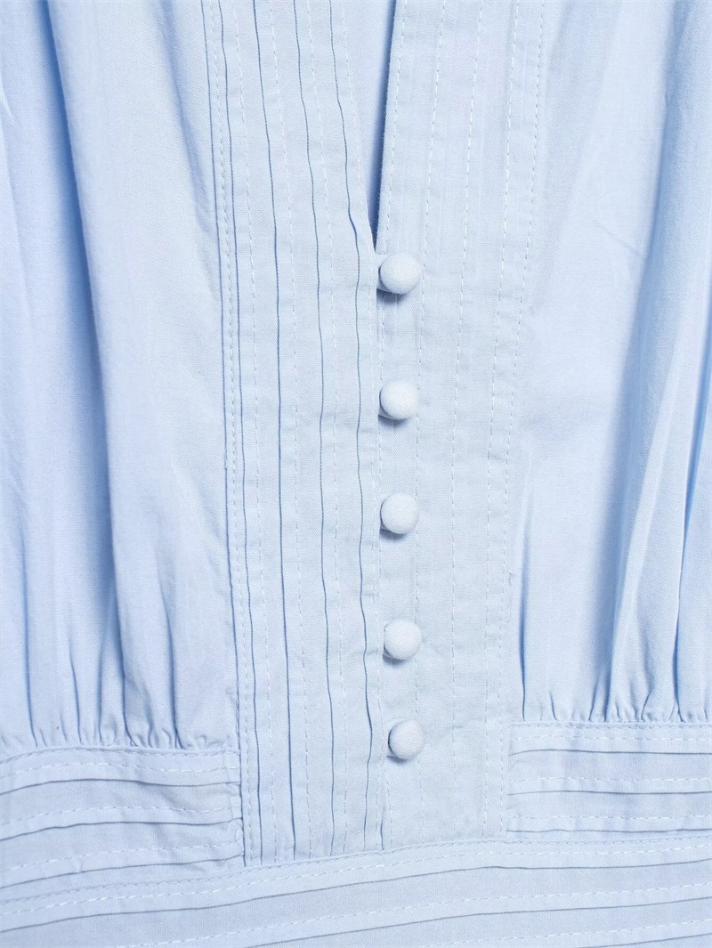 Women's ruffle-trim puff-sleeve blouse in blue – slim-fit elegant commute top