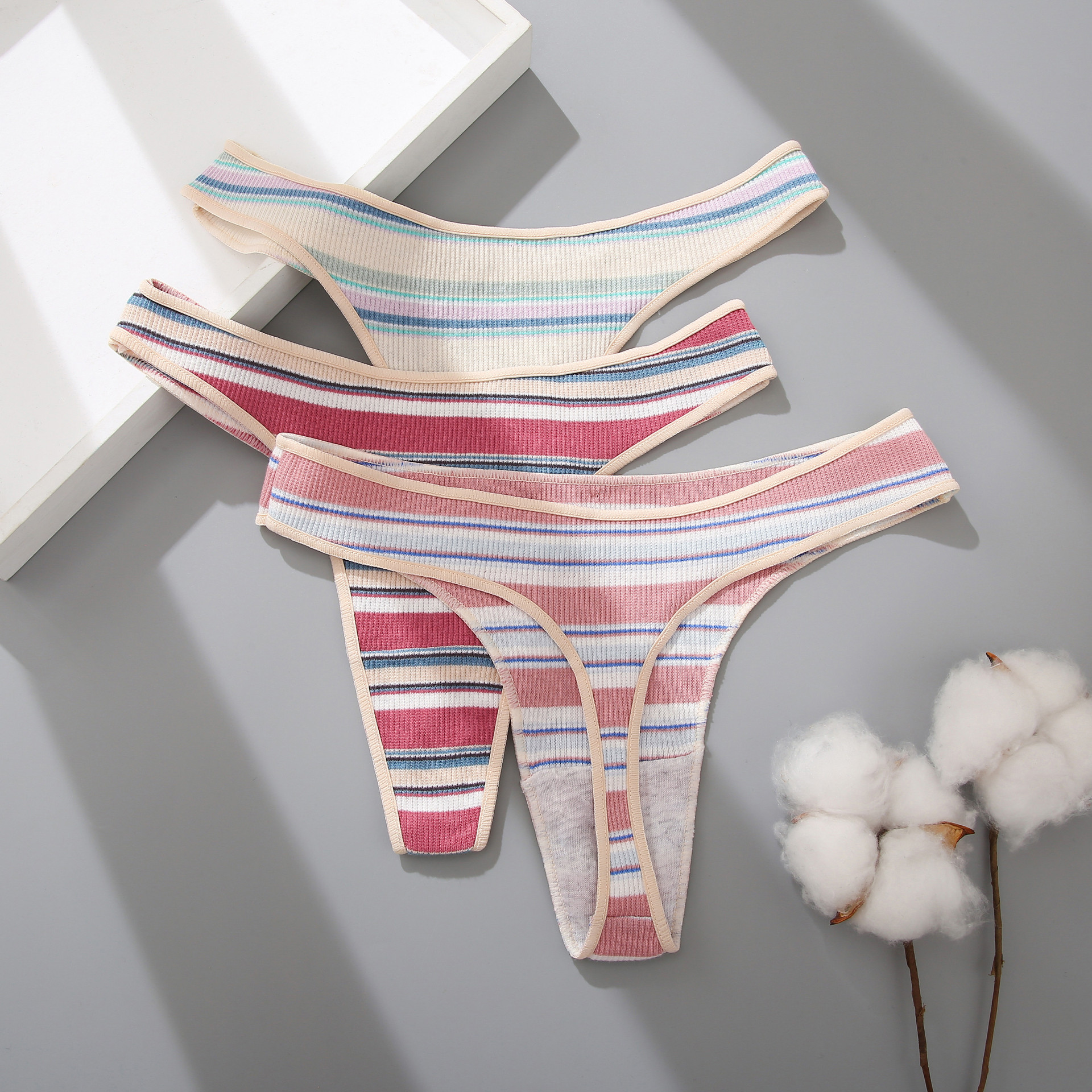 Title 5, Ladies thong panties with striped stitching, ne...