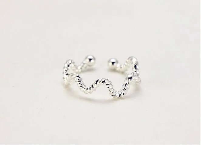 Title 4, Wave Twist Ring voor dames Elegantie en modern ...