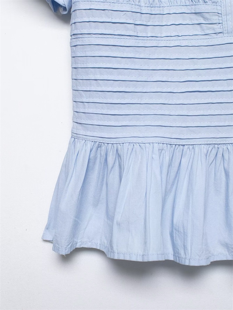 Women's slim-fit ruffle-trim blouse in white – sleeveless elegant commute pullover