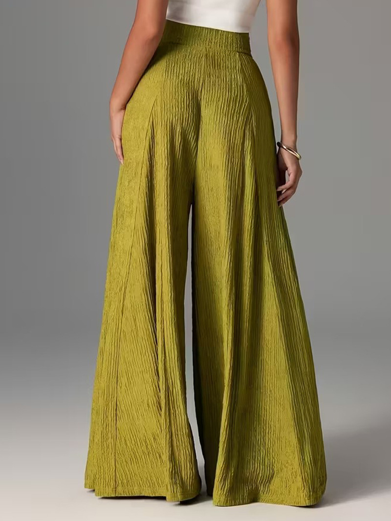 Pantalones holgados de color liso con cintura elástica y talle alto. 71f9d264 83a9 4673 A622 8f63819d9c10