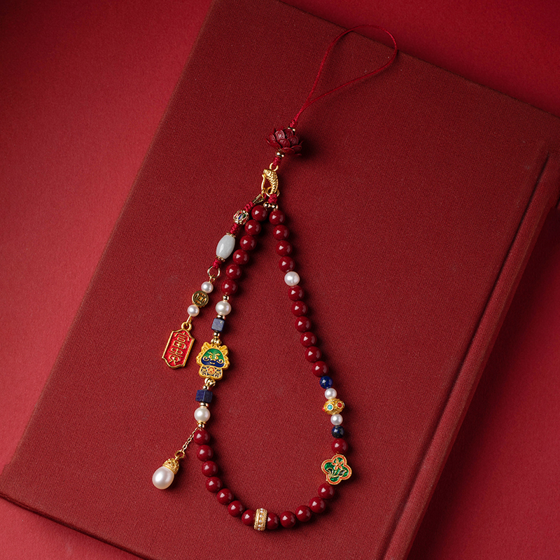 تعليقة هاتف محمول وسلسلة مفاتيح بتصميم تنين القينبار