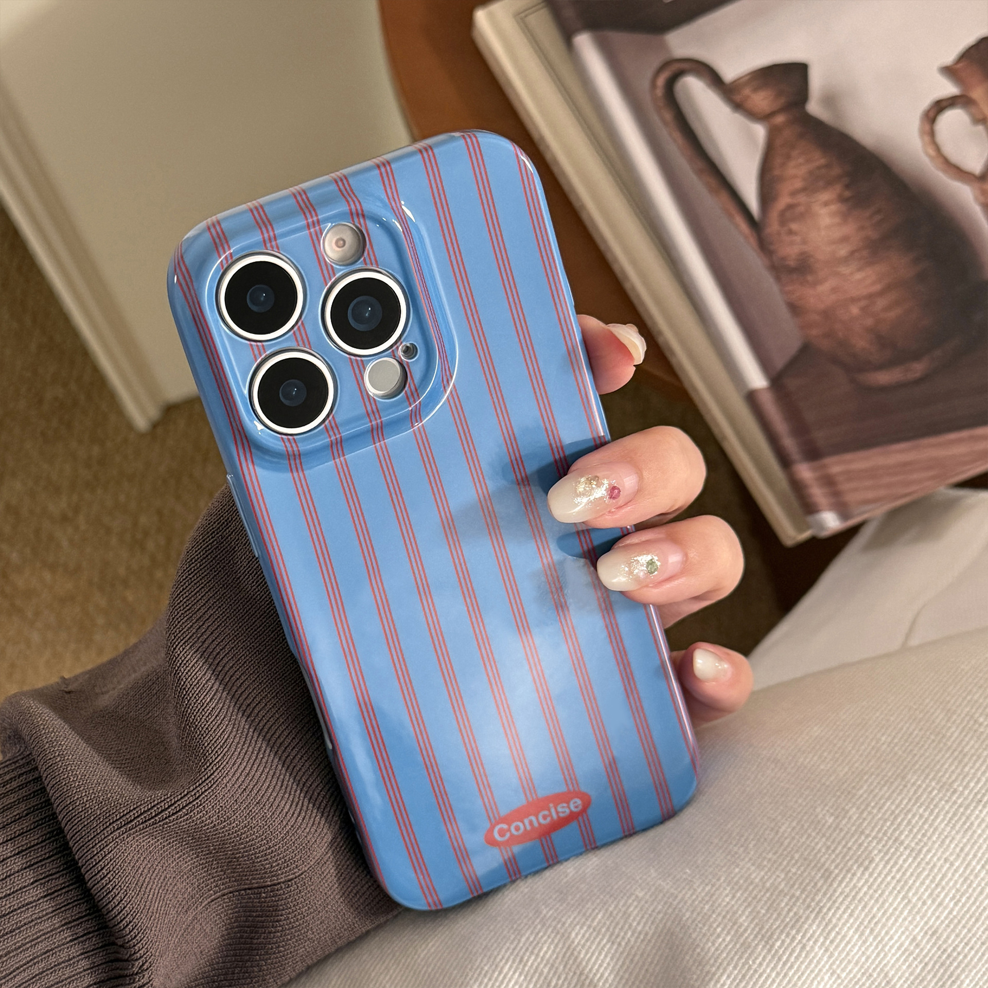 Red And Blue Striped Phone Case With A Retro Film-inspired Design And A Personalized Stand For Full-body Protection