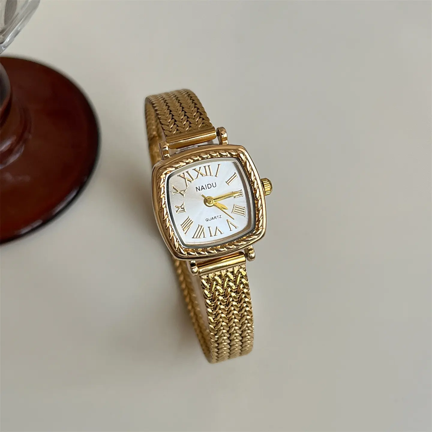 Golden Roman-style Square Watch