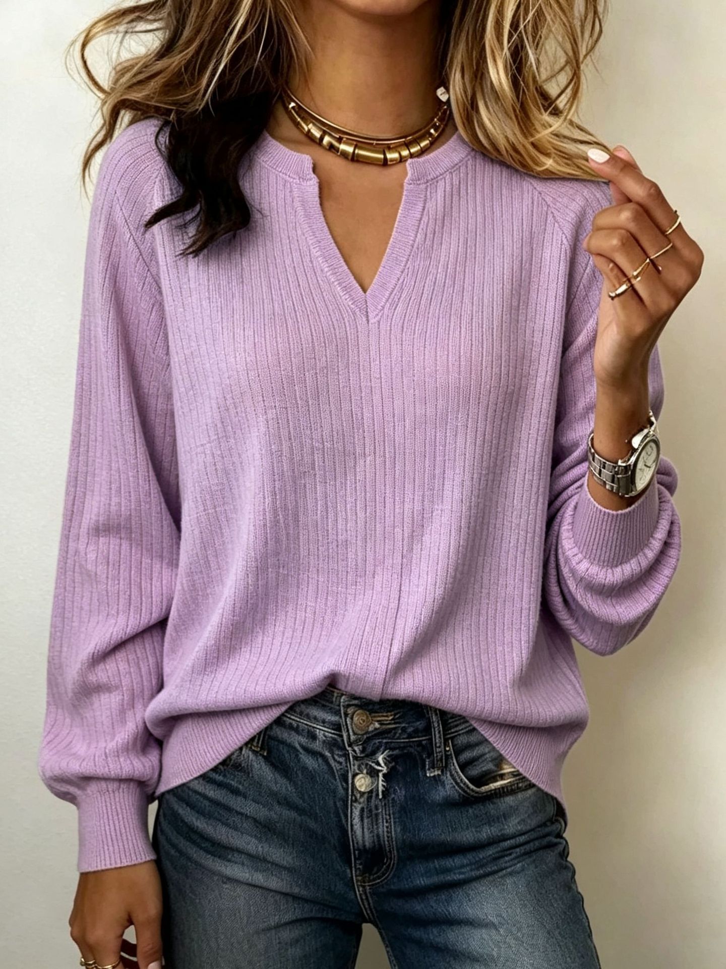 Women's loose ribbed pullover sweater in lavender purple – front view showing V-notch neckline and raglan sleeves