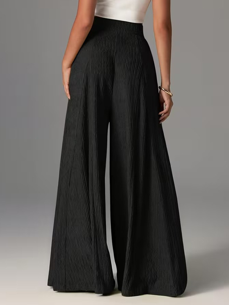 Pantalones holgados de color liso con cintura elástica y talle alto. 74c9cc6d C0e4 4a79 96fe B0697da5db8c