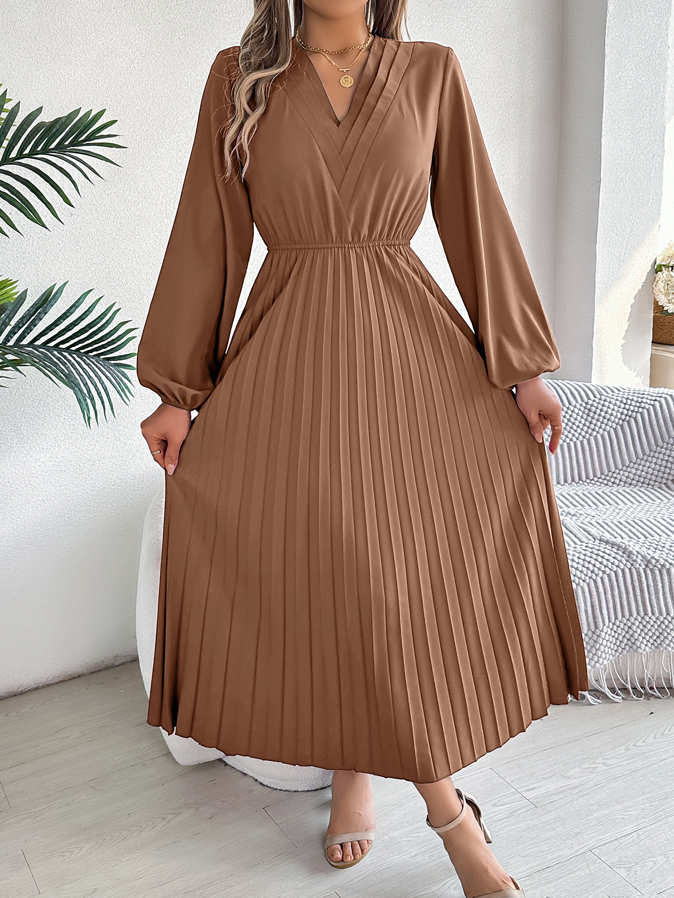 Elegant Womens Long Pleated Dress With A Triple V-Neck Long Sleeves And A Defined Waist
