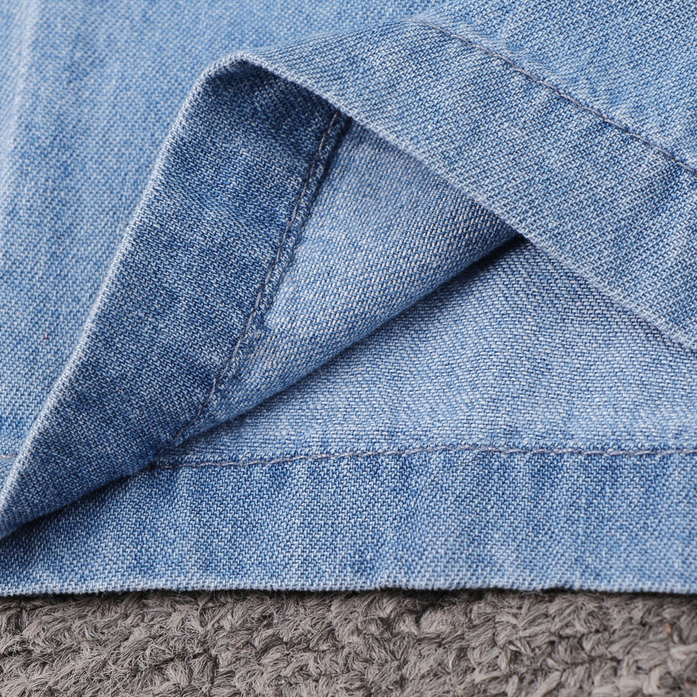 Women's wide-leg cotton overalls – light blue waist and fit detail