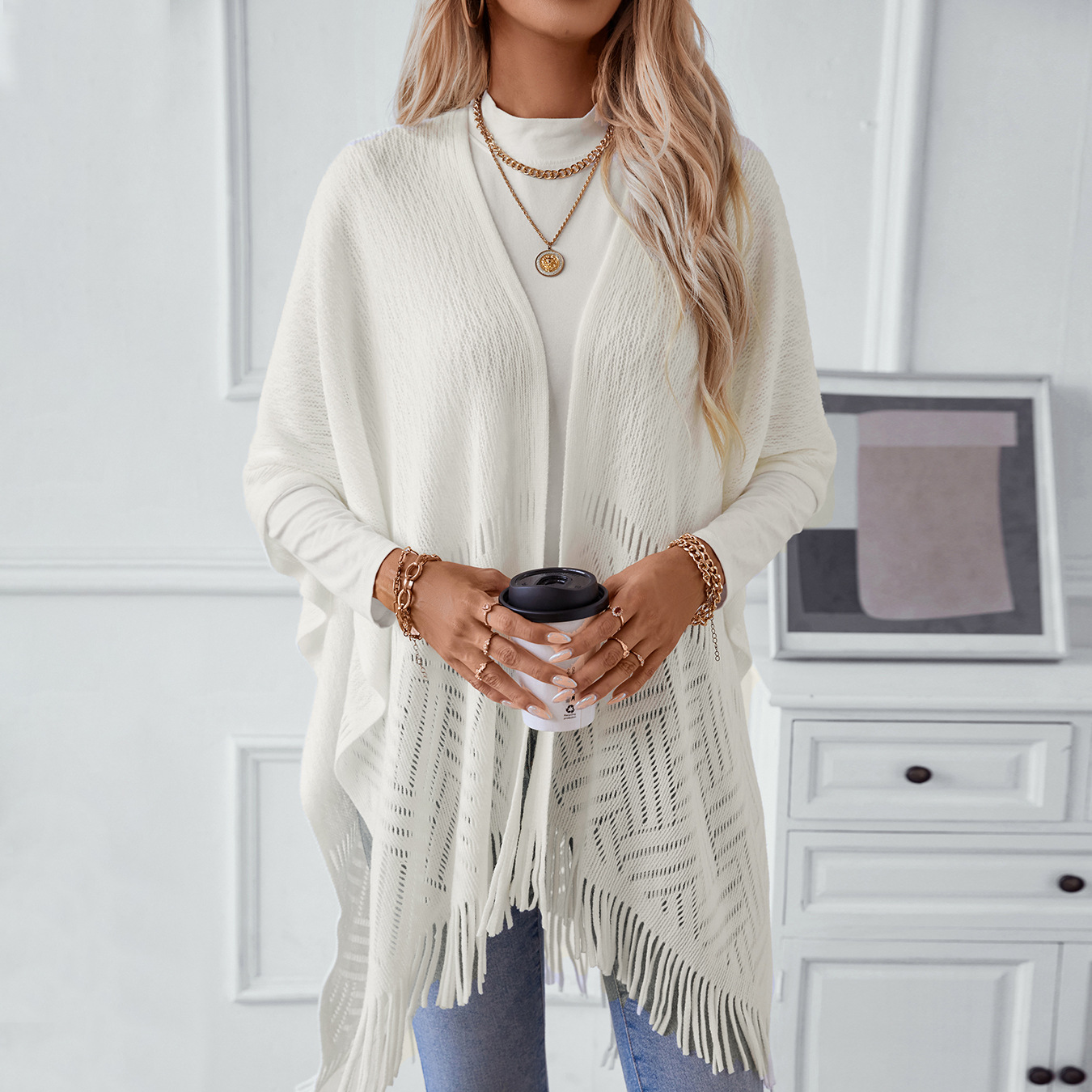 Women&#39;s autumn and winter casual loose sweater with tassel cape and shawl