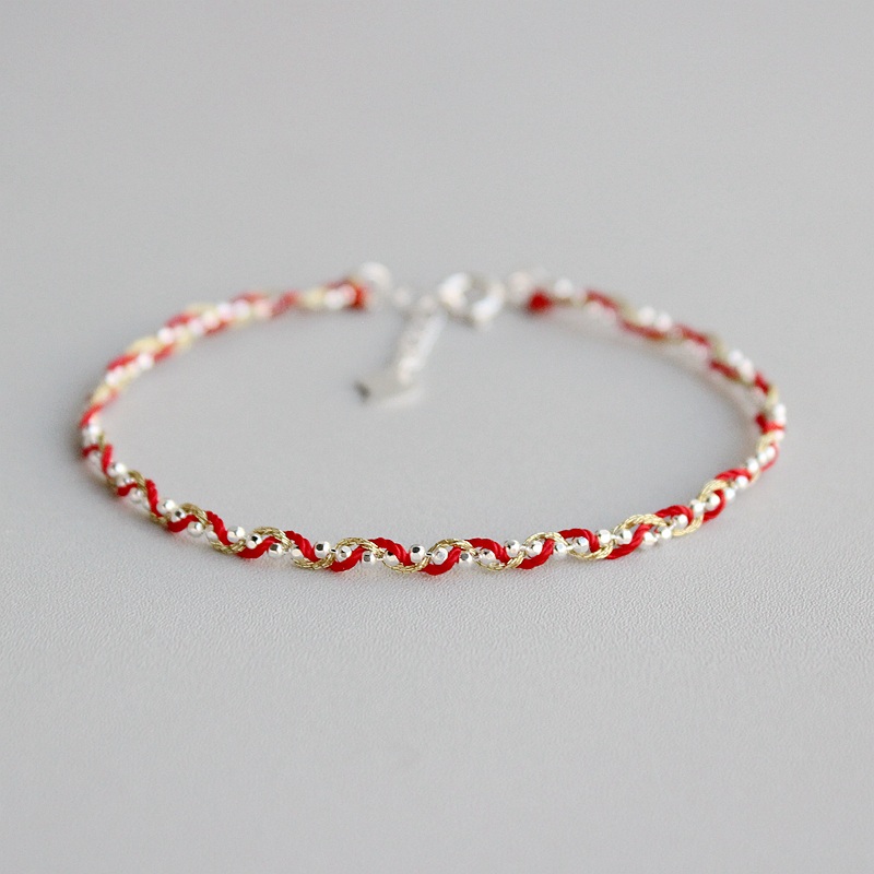 Silver Braided Bracelet With Gold Thread