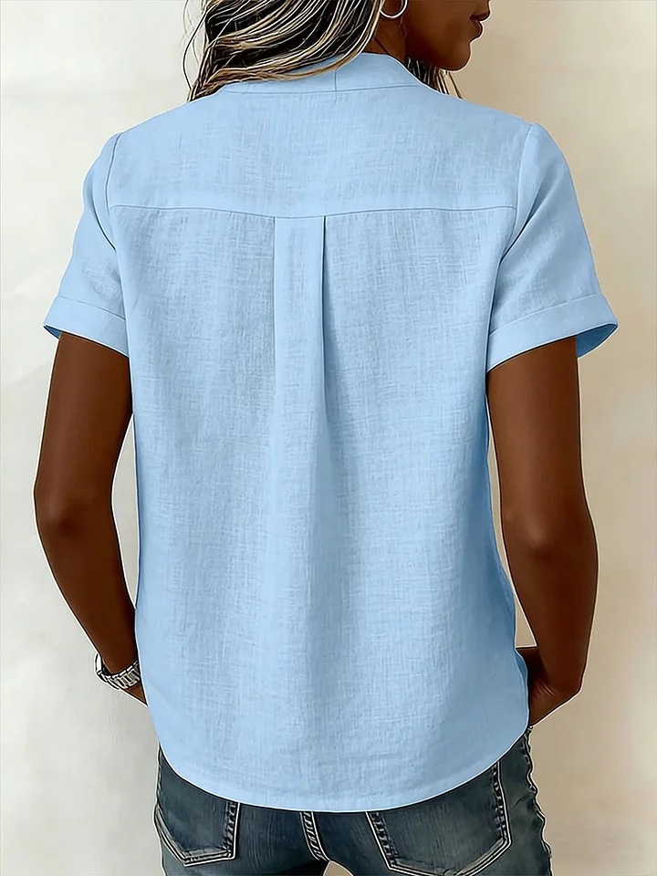 Women's cross-neckline loose top – light green colorway lifestyle photo