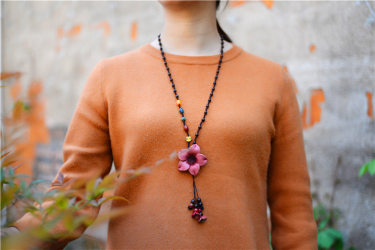 Title 2, Long sweater chain cowhide flower pendant