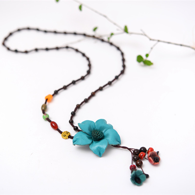 Title 7, Long sweater chain cowhide flower pendant