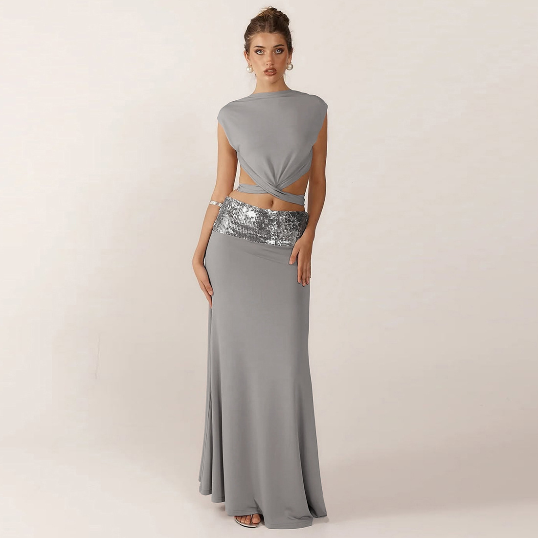 And Elegant Backless Top Paired With A Patchwork Maxi Skirt