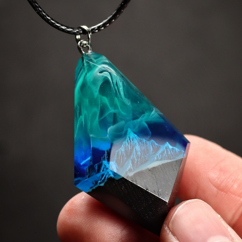 Aurora Resin Luminous Pendant Noctilucent Necklace. Product information: Treatment Process: Polishing, Color: Color, Material: Plastic/resin, Popular elements: Aurora, Style: Personality. Packing list: 1*Resin Necklace. Images of the product.