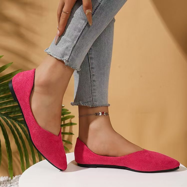Women's suede flat shoes pair view