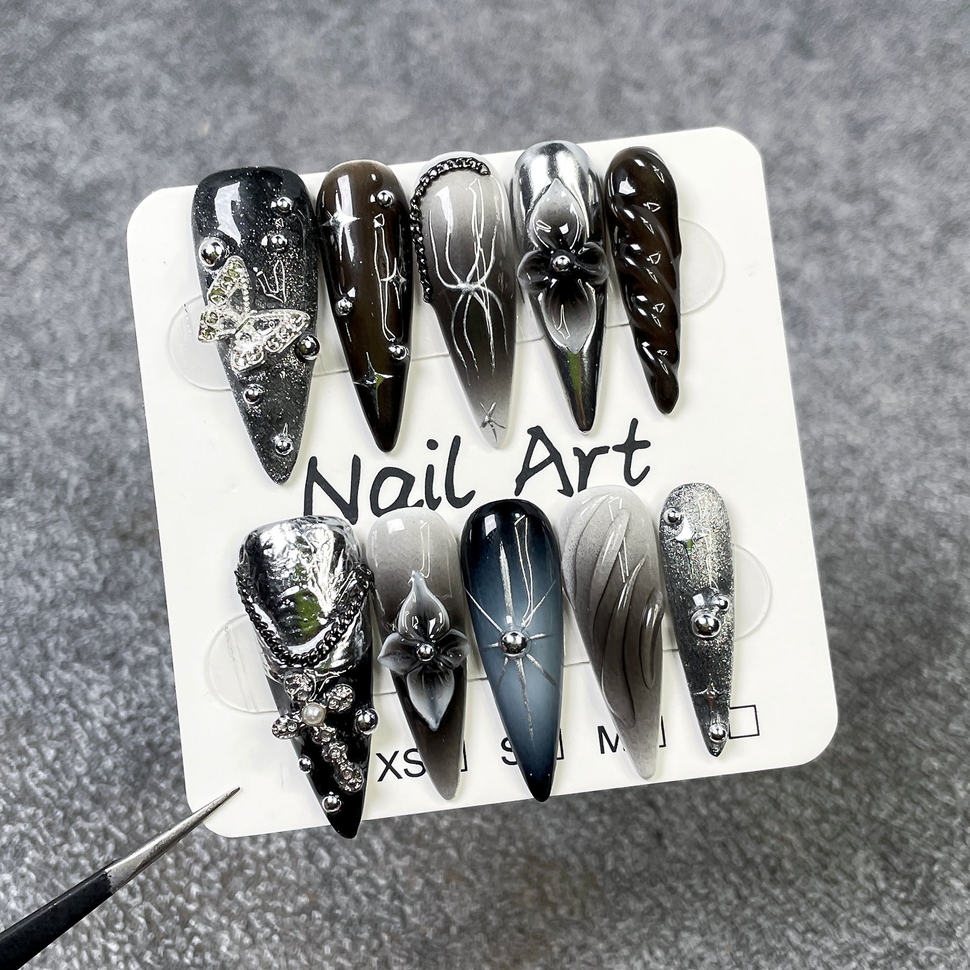 Long Pointed Dark-hued Sweet-and-cool Cat-eye Nail Art With 3D Sculpted Detailing