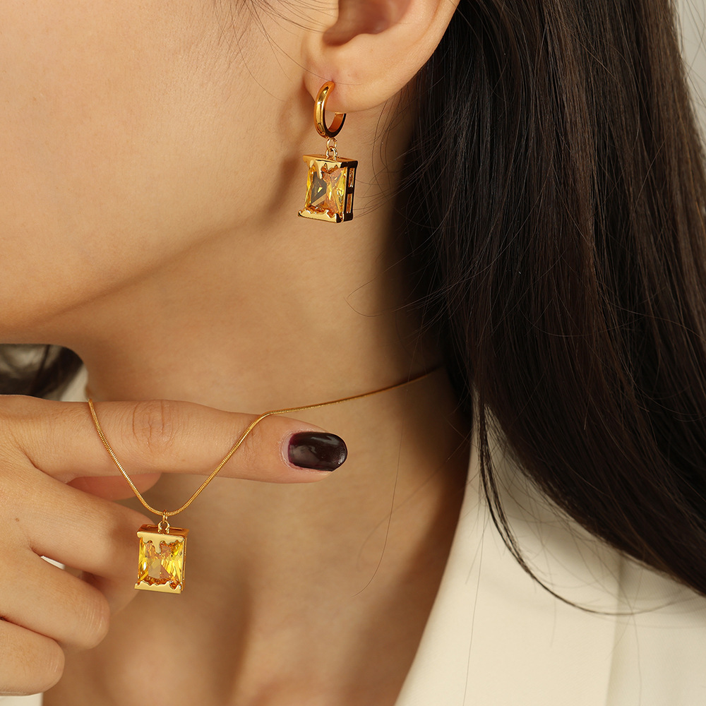 Oil Lamp Inspired Pendant In Stainless Steel With Mixed-metal Styling