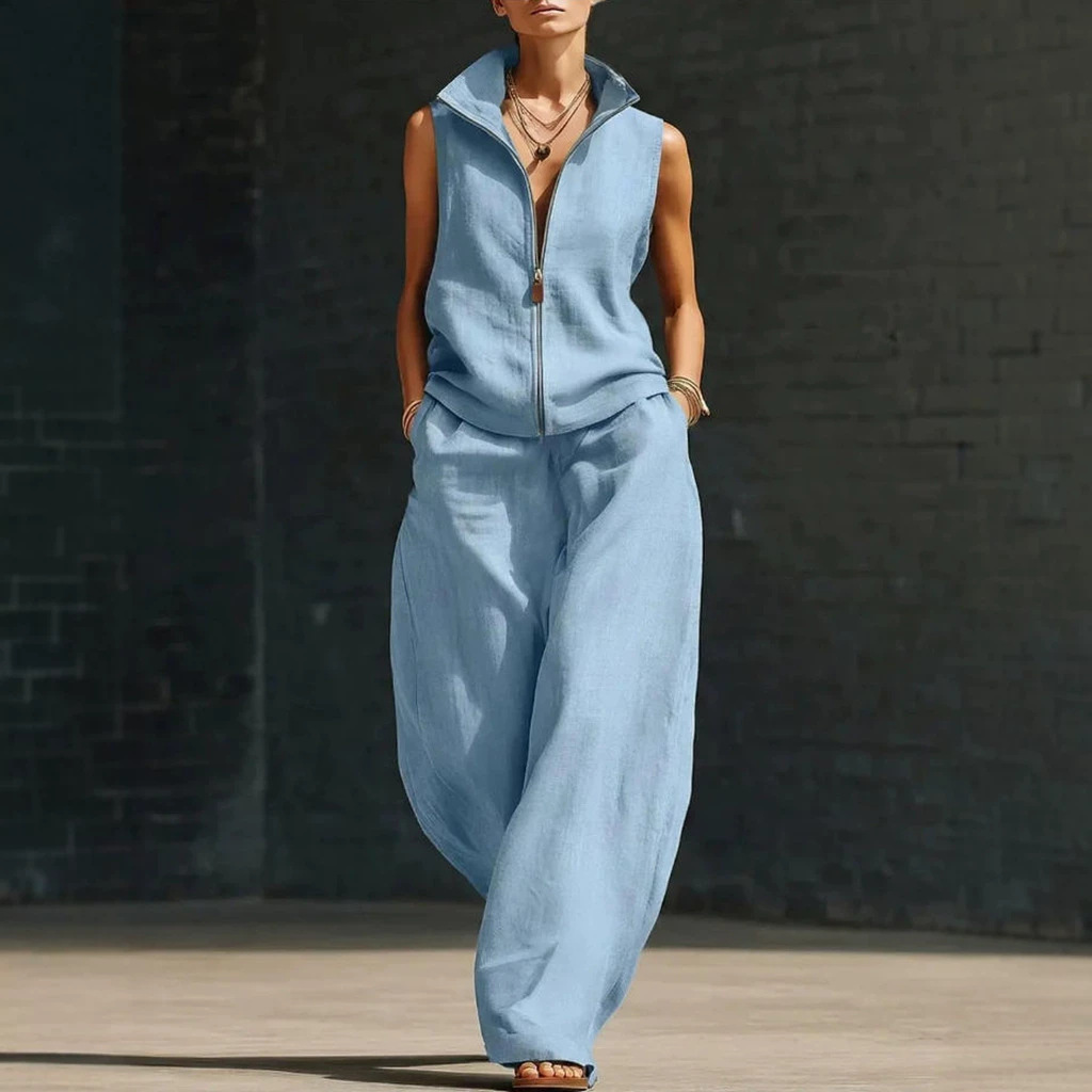 Woman in light blue sleeveless stand collar two-piece set demonstrating breathable fabric comfort