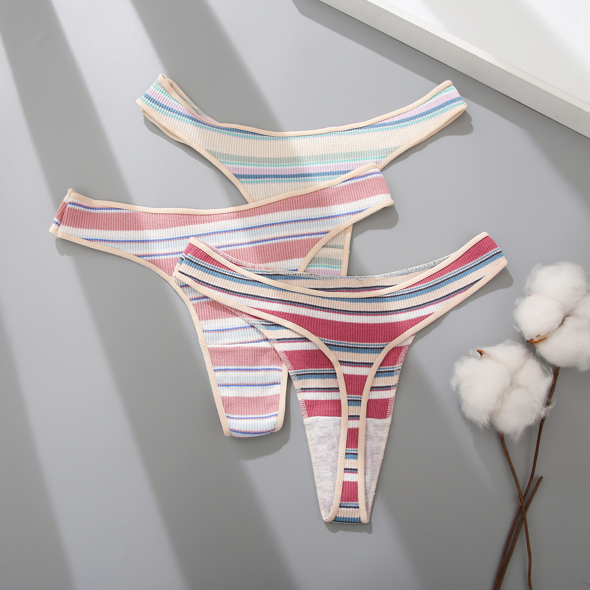 Title 3, Ladies thong panties with striped stitching, ne...