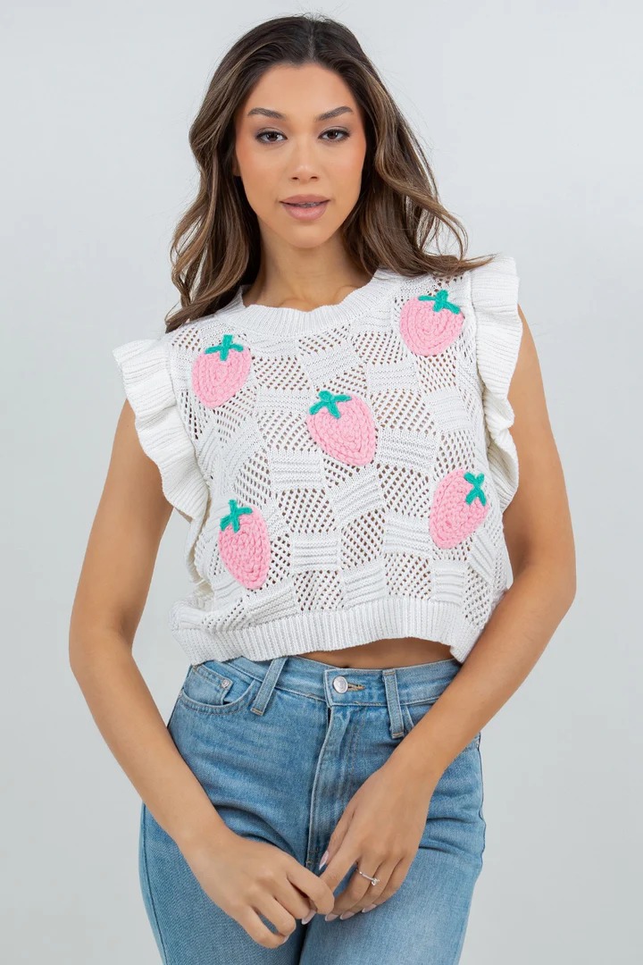 Women's hollow-out knit vest in White – styled for vacation resort wear with sandals and skirt