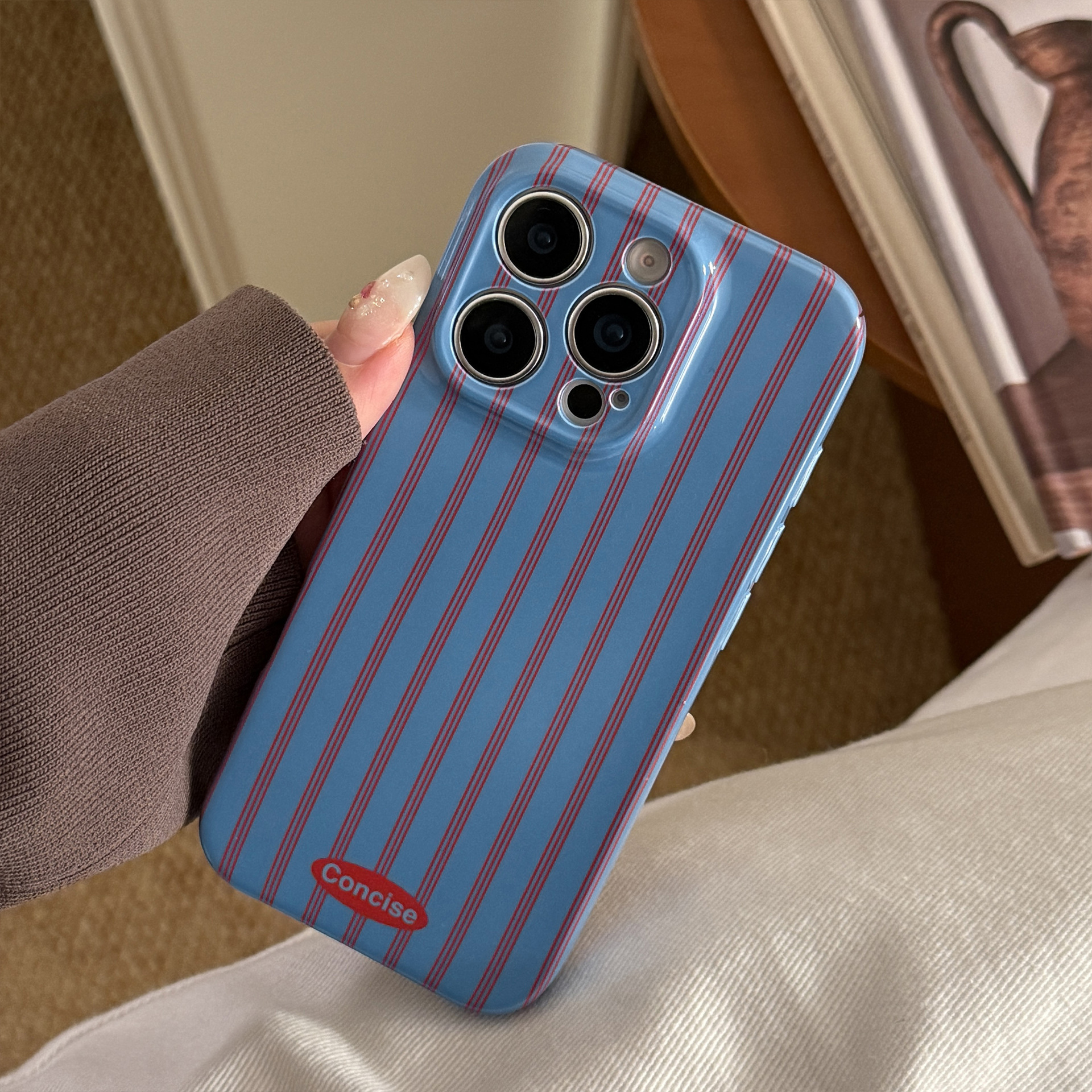 Red And Blue Striped Phone Case With A Retro Film-inspired Design And A Personalized Stand For Full-body Protection