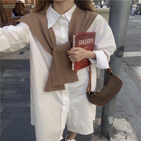 A Warm And Cozy Wool Shawl Or A Lightweight Cardigan That Can Be Layered