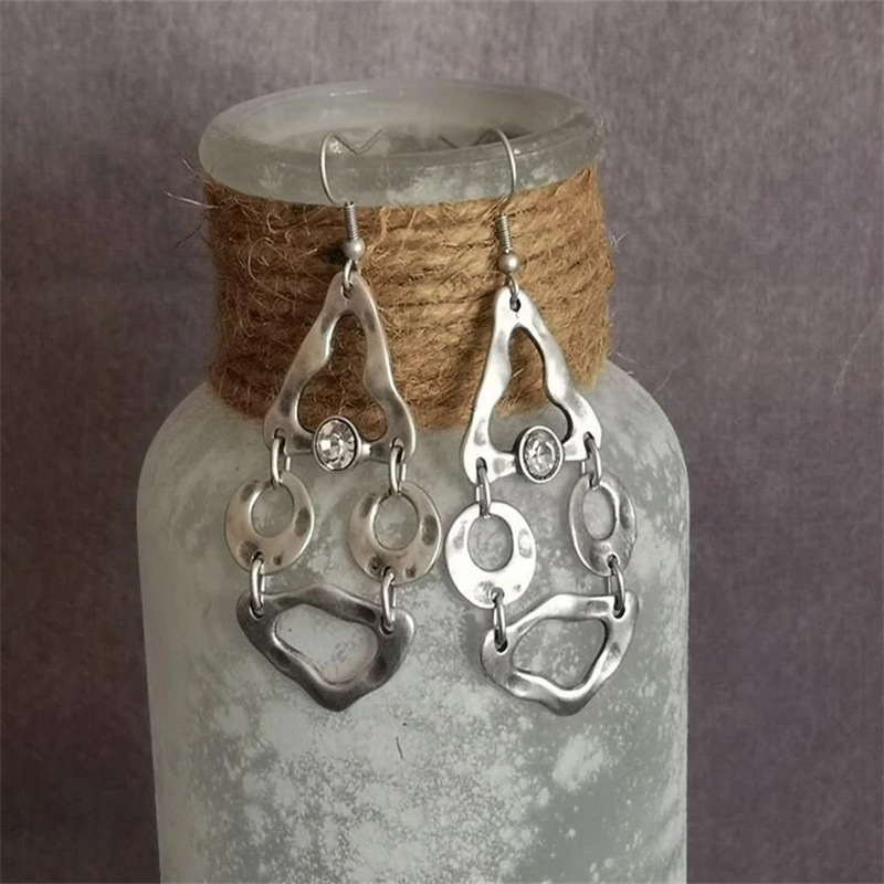 Artistic Retro Geometric Stitching Irregular Hollow-out Earrings