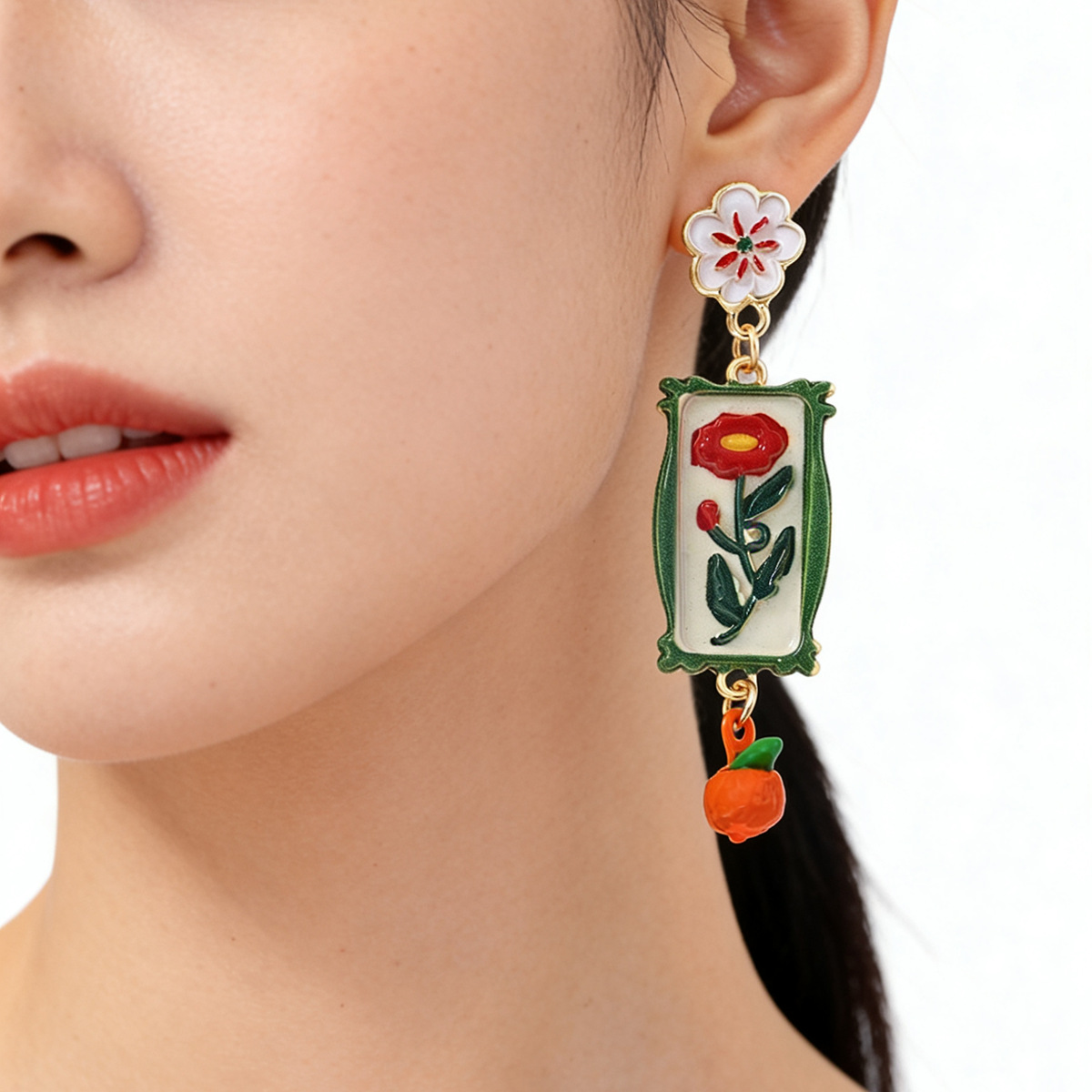 Retro Floral Earrings With A Faux Orange Pendant