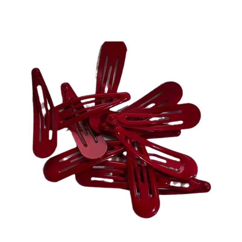 Bangs With Wispy Strands Sidemounted Red Starshaped Drop Hair Clip