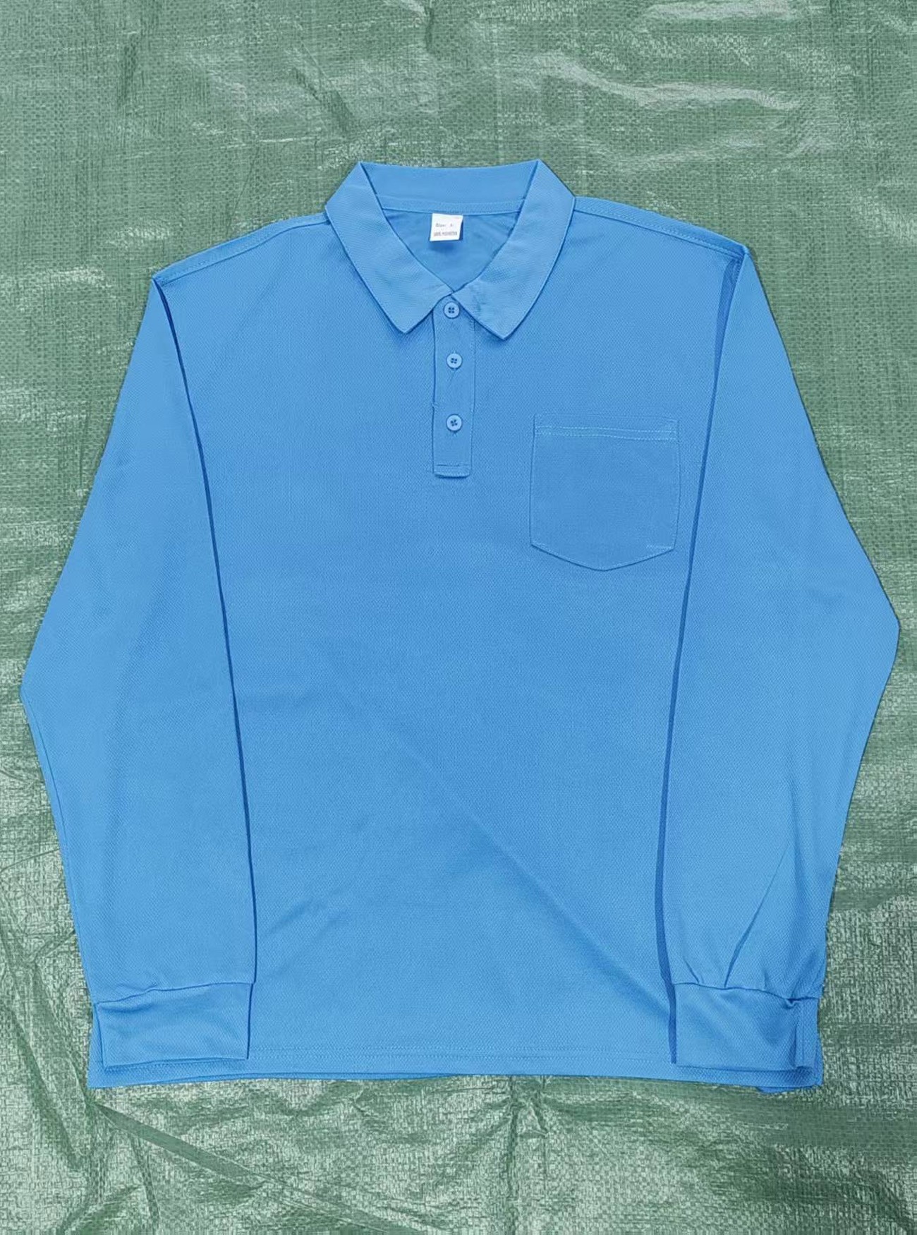 Men's Chest-Pocket Long-Sleeve Polo Shirt - blue flat-lay front showing collar, buttons and chest pocket