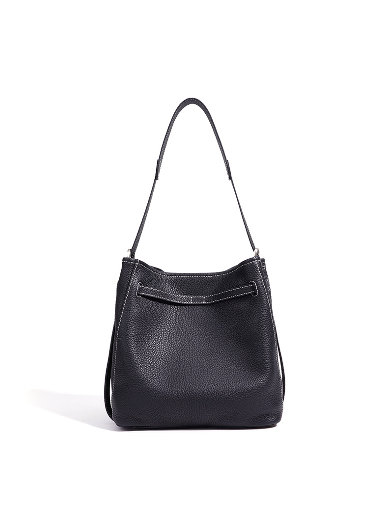 Minimalist bucket handbag worn view