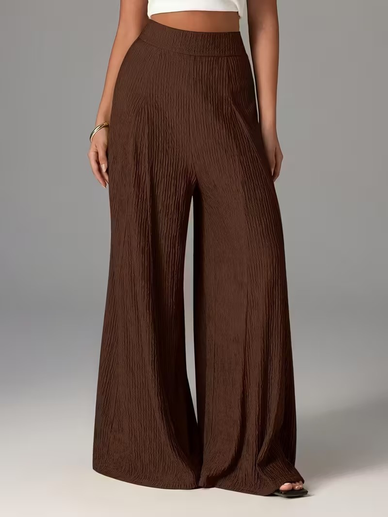 Pantalones holgados de color liso con cintura elástica y talle alto. 92a0a0b4 6084 4112 83fc 633cf39358b9
