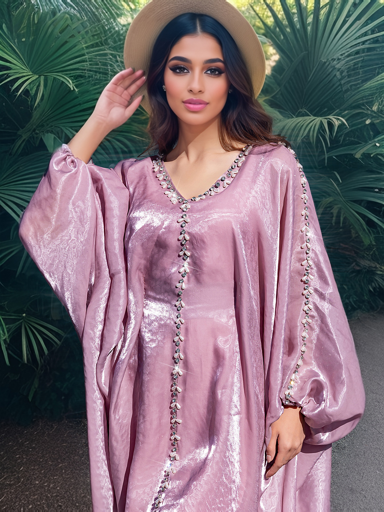 Hand-stitched beaded dress - detail view of beadwork craftsmanship