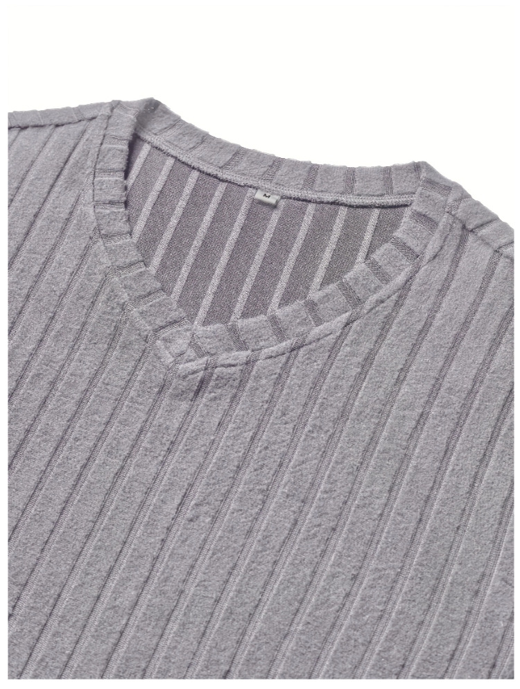 Men's ribbed V-neck sweater detail