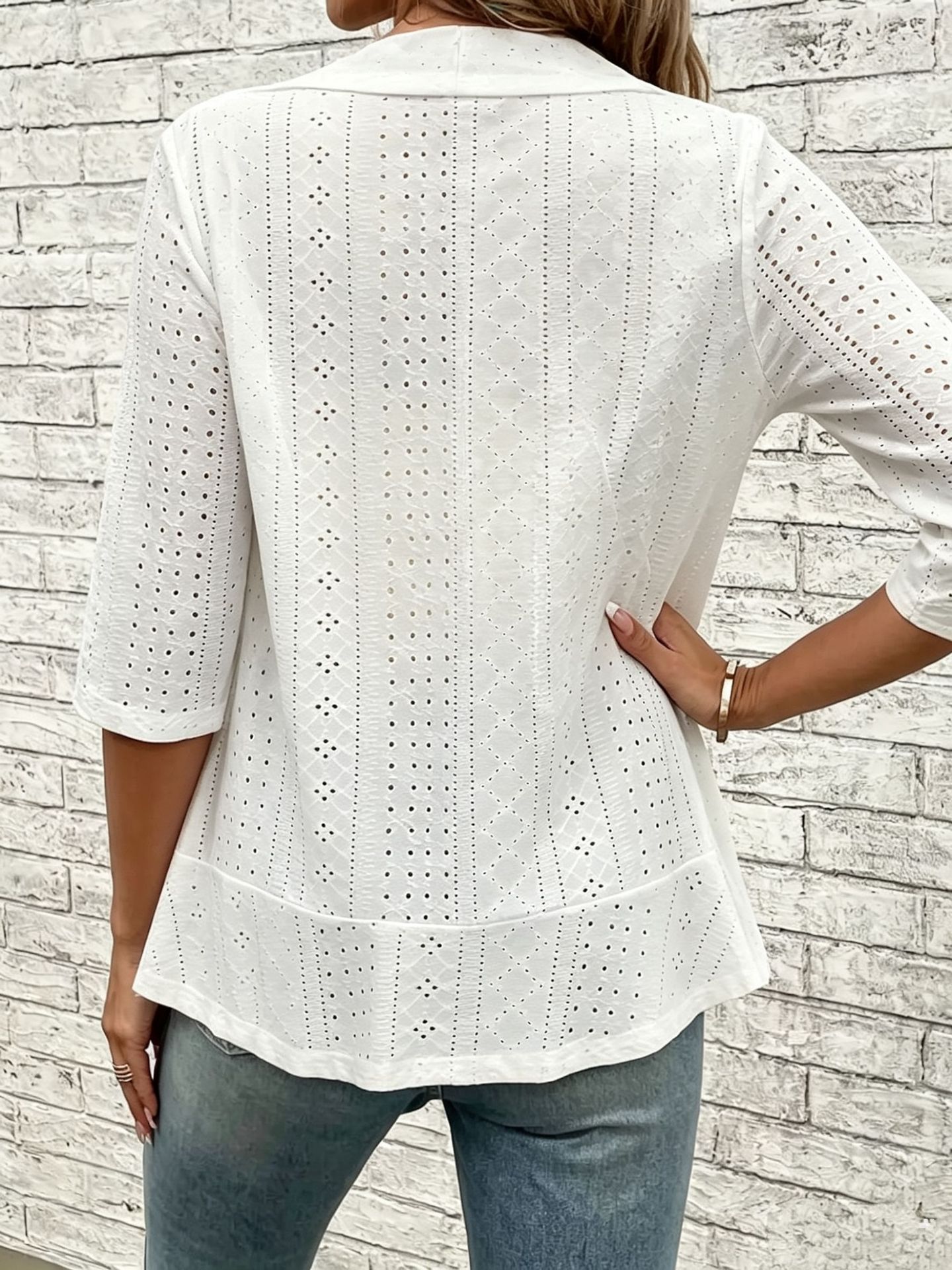 Women's white eyelet blazer jacket – styled on model showing full open-front silhouette and outfit