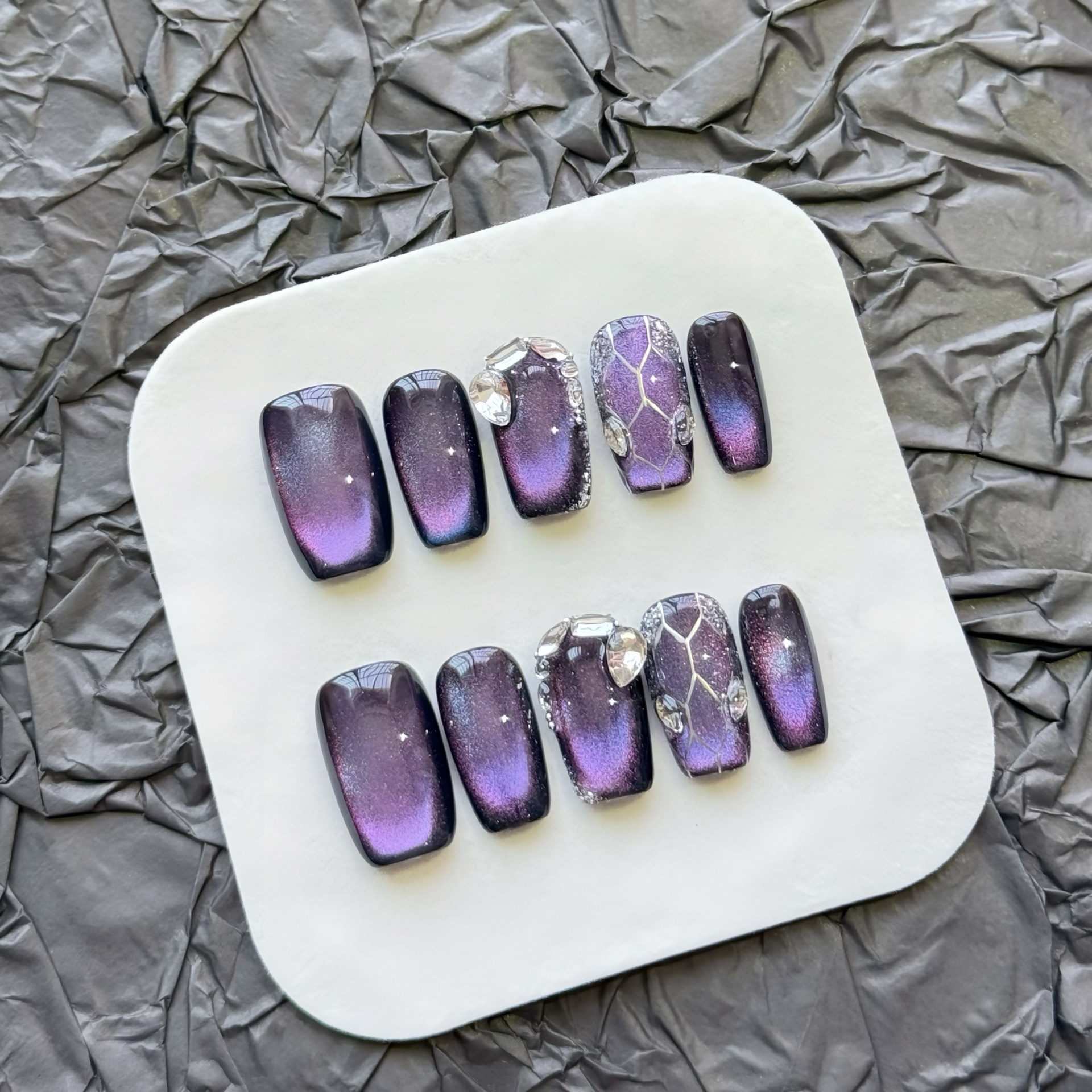 Elegant Purple Cat-Eye Nail Art
