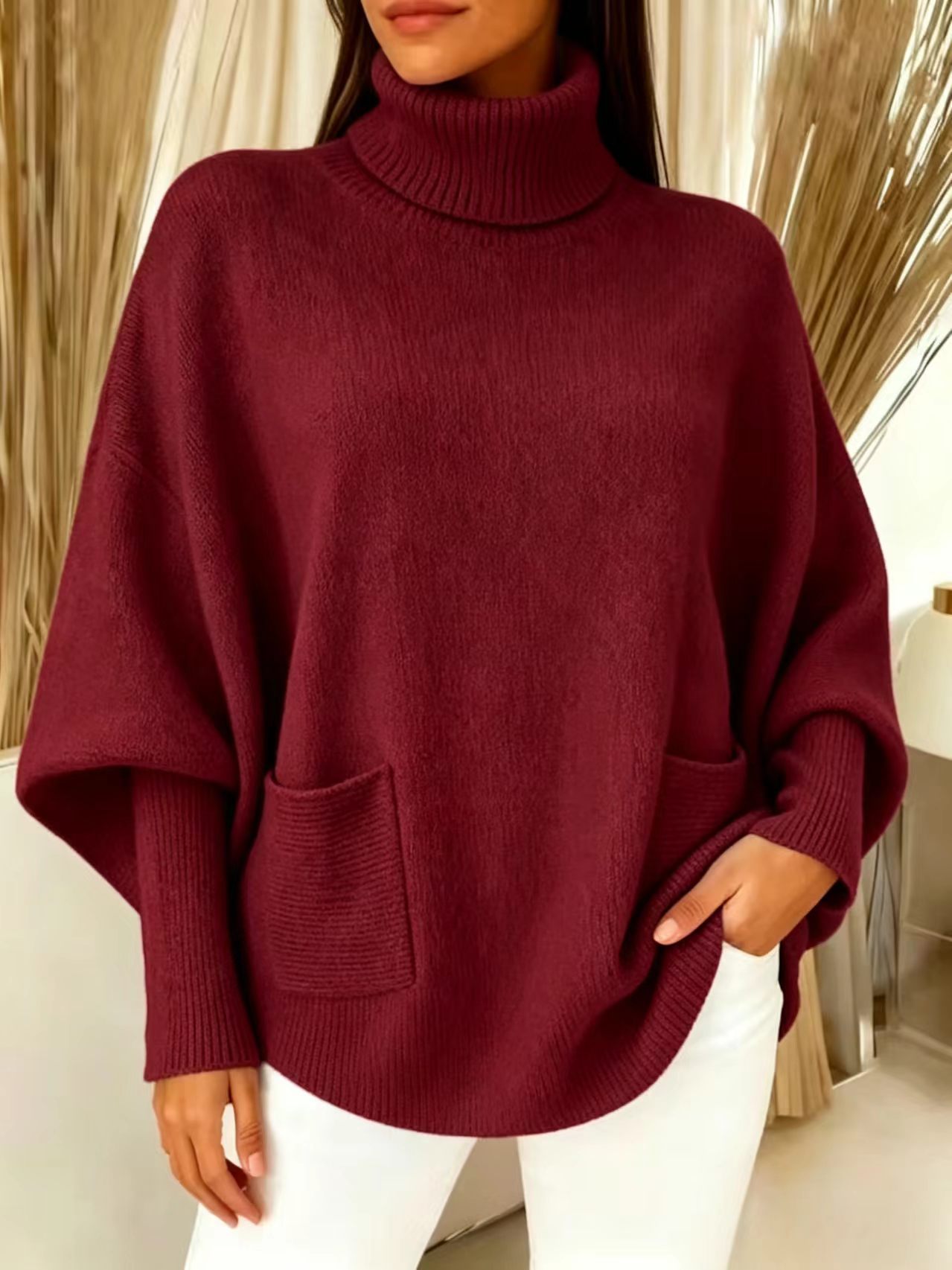 Women's oversized sweater – size and fit reference on model showing full silhouette