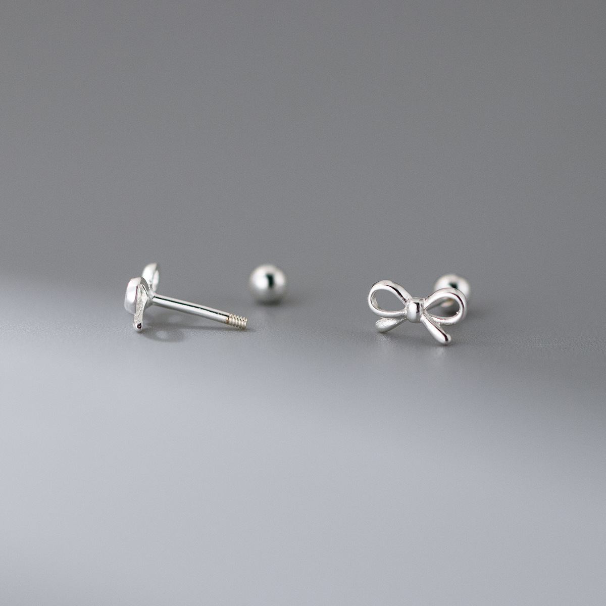 Fashion Hollowed-out Bowknot Thread Stud Earrings