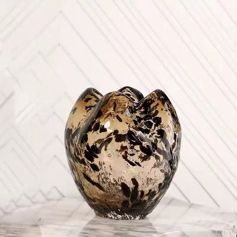 A Variety Of Modern Glass Vases And Floral Arrangements For Showroom Displays And Home Decor