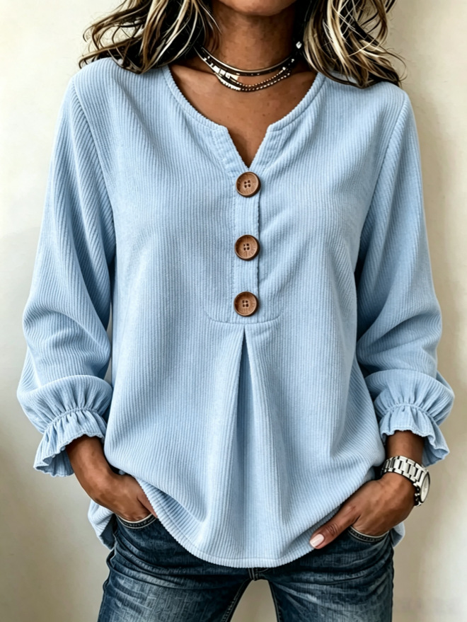 Women's corduroy blouse styled with trousers – minimalist commute outfit