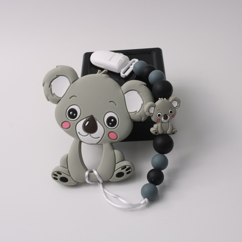 Title 7, Conjunto mordedor de silicone koala com corrent...