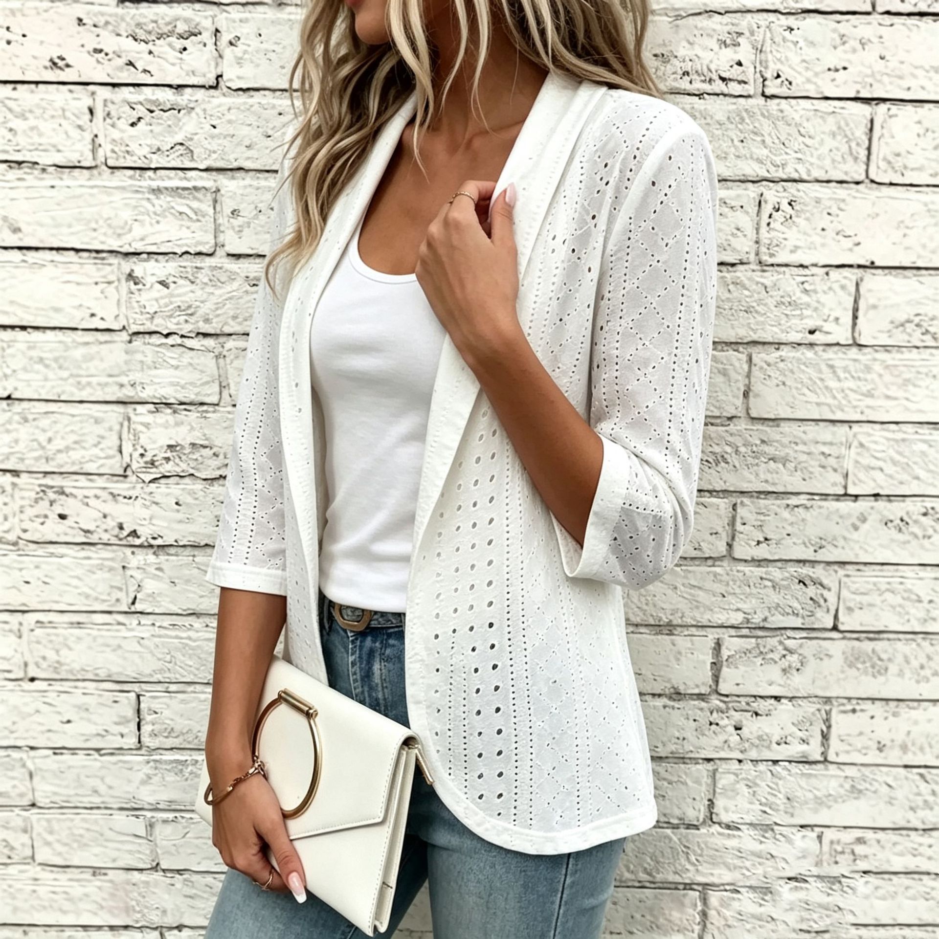 White open-front blazer – lifestyle shot showing smart-casual styling with jeans and accessories
